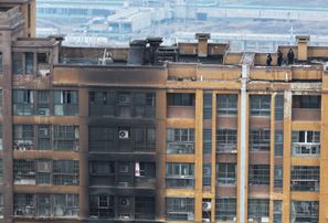 Ugunsgrēkā Ķīnas daudzdzīvokļu namā daudzi bojāgājušie